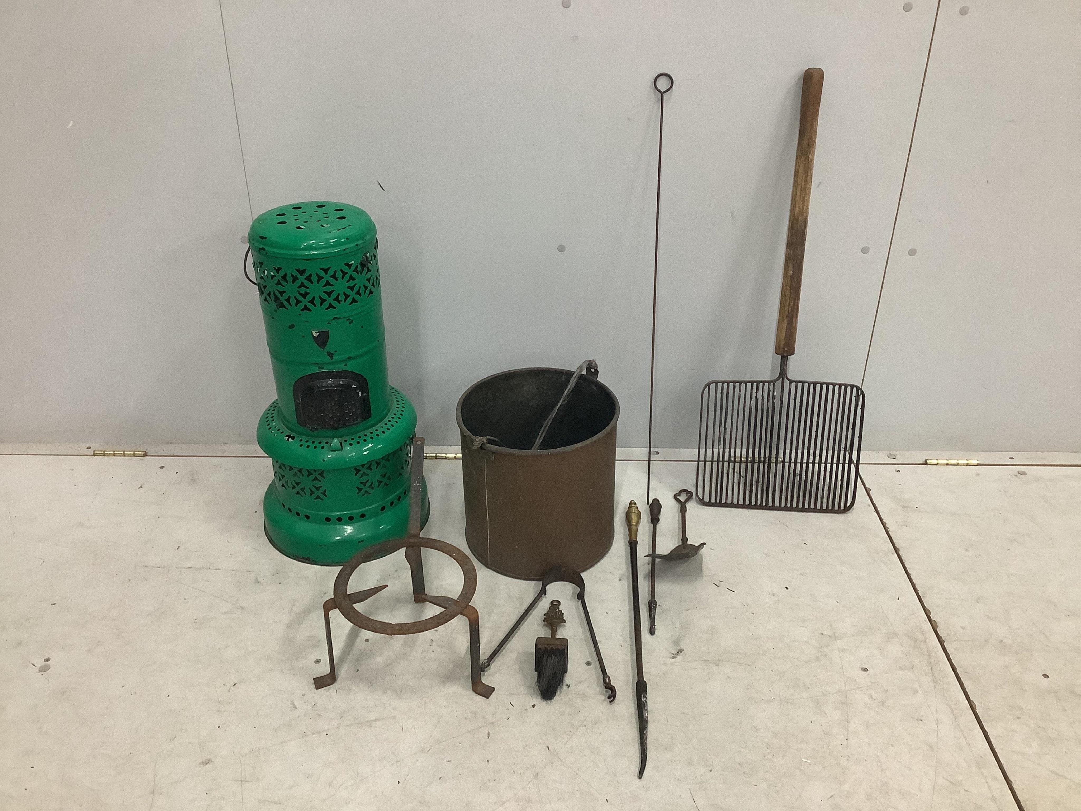 An enamelled conservatory heater and assorted metalware. Condition - poor to fair